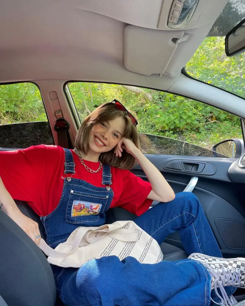 denim overalls and red tees for fourth of July outfit ideas