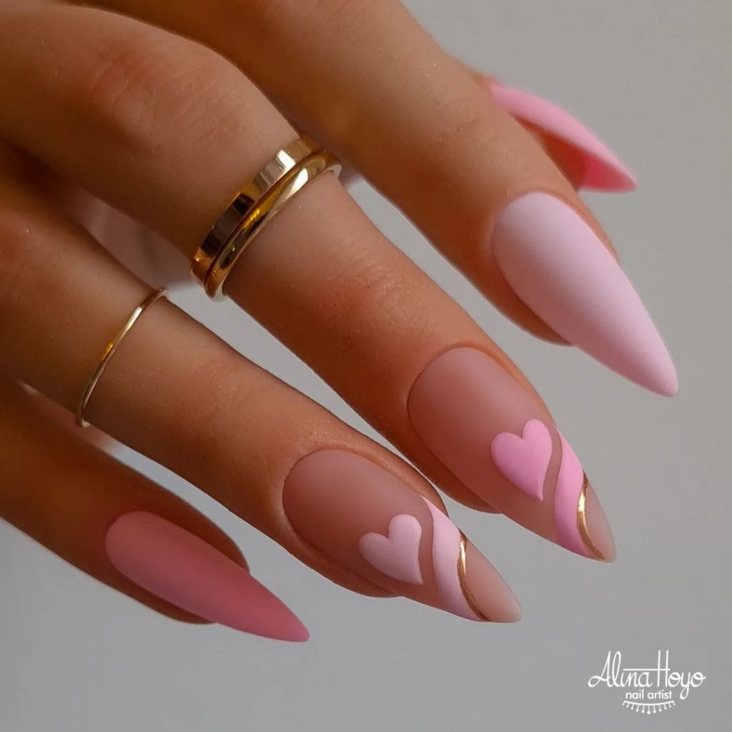 Long pink nails ideas with hearts