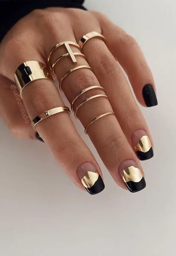 Glamorous black and metalic nails for February nail art design