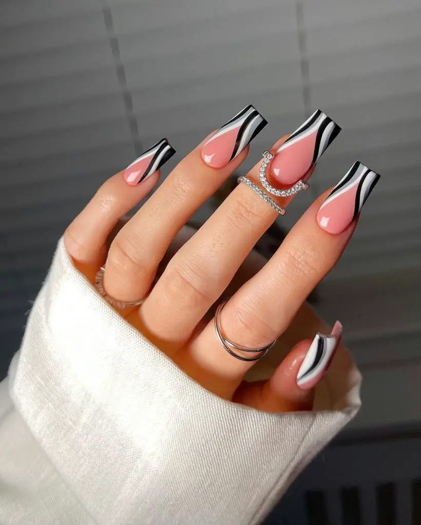 white and black swirl nails