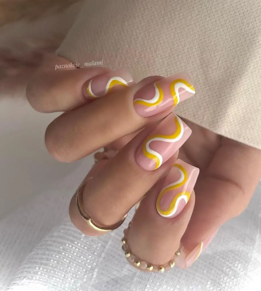 yellow nails in wavy nail art