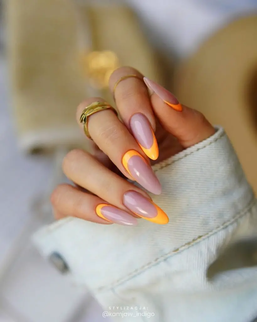 Orange nails with almond nail shape