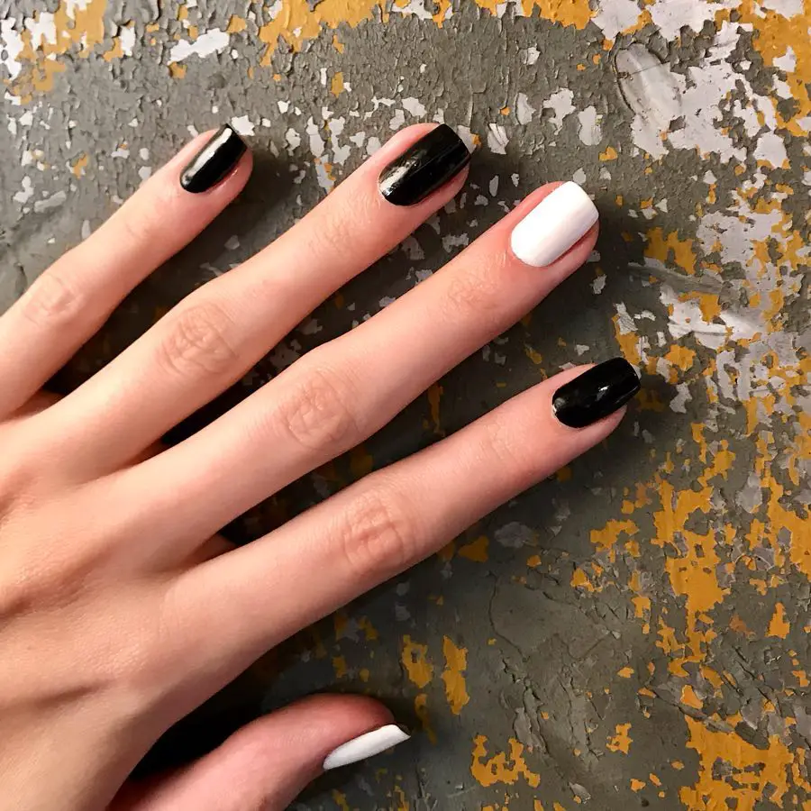 Solid black and white manicures