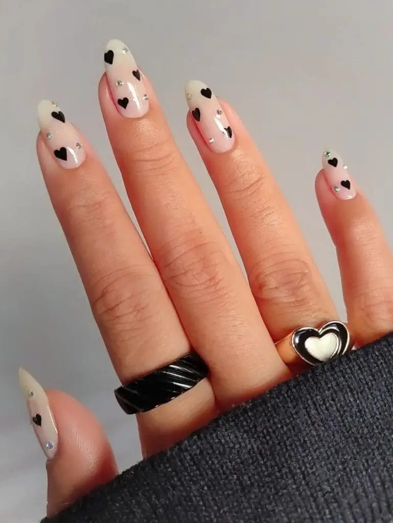 Hearty and rhinestone nails