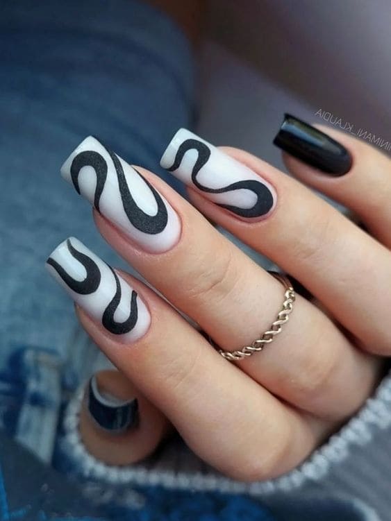 Black swirl nails