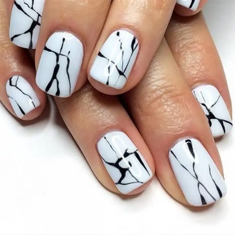 Marble-inspired nails in black and white