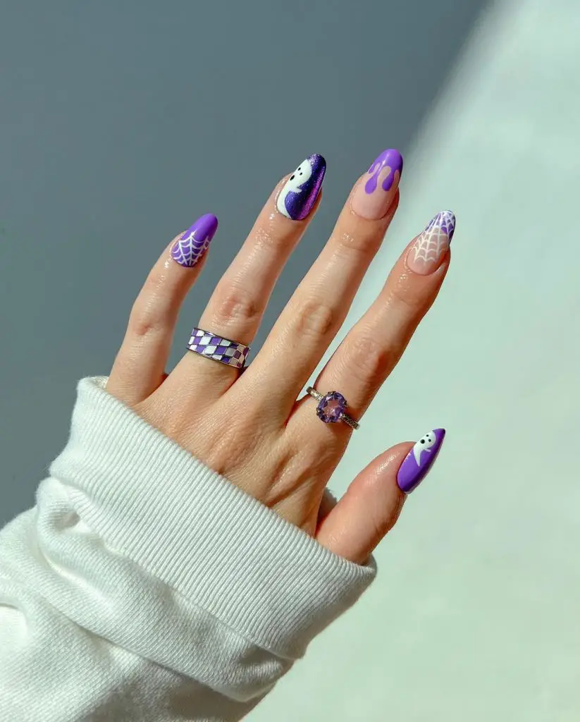 Purple nails| Spooky nails inspo