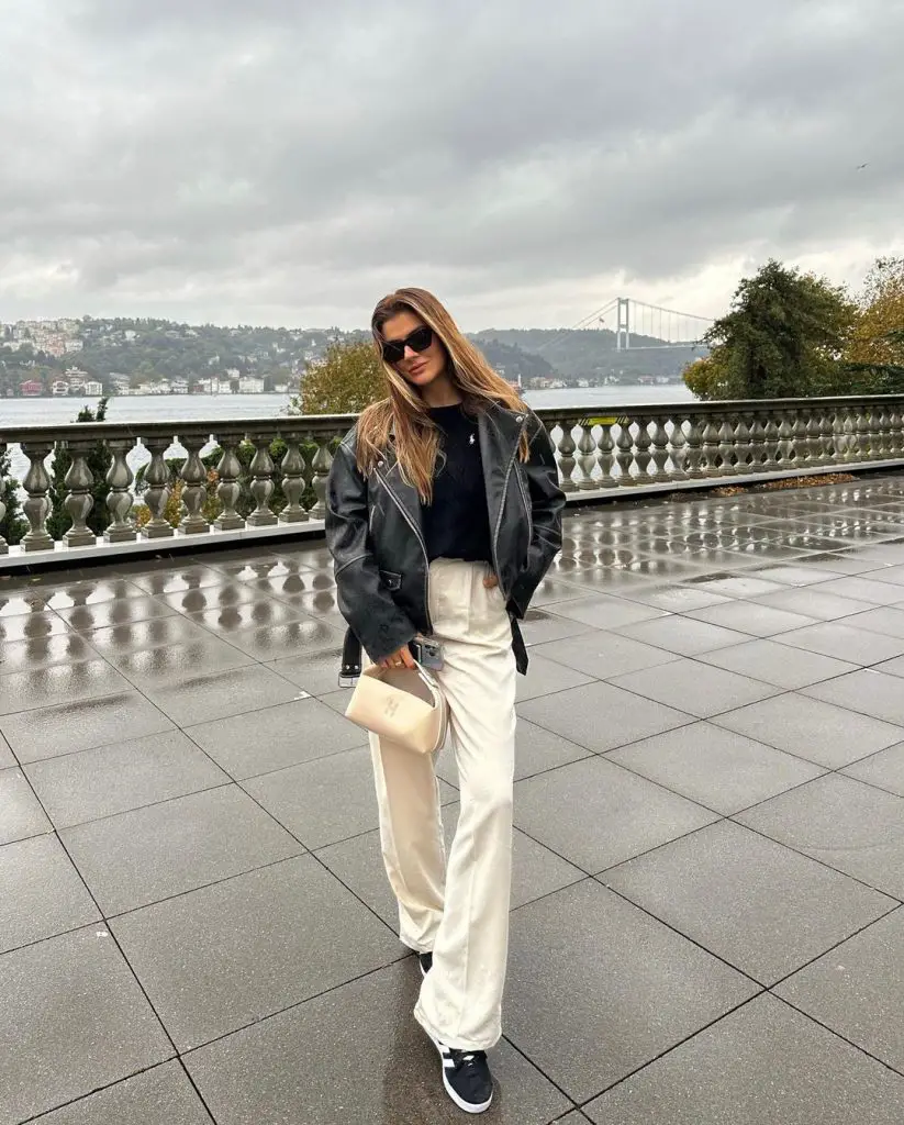 Chic rainy day outfit with leather ride jacket and sweatpants 