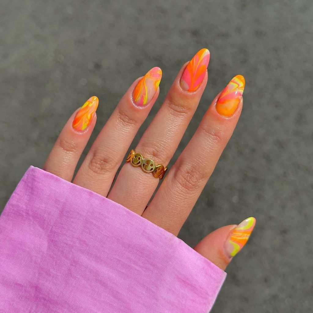 Orange tie dye nails 