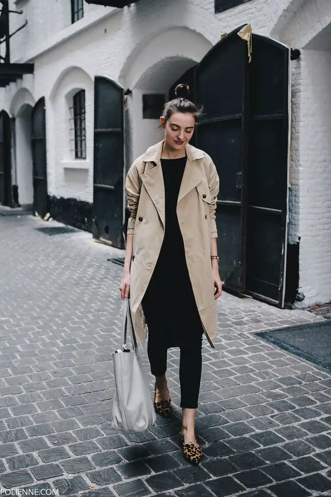 Nude coat with black tunic and white legging 