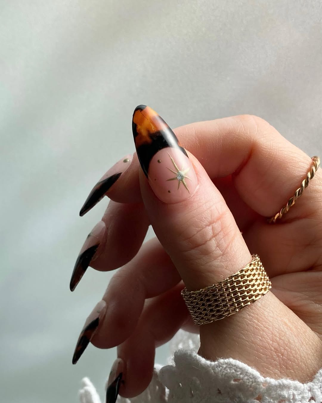 frenchie tortoise nails 