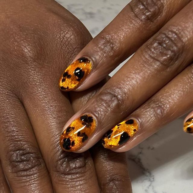 gold glam tortoise shells nails